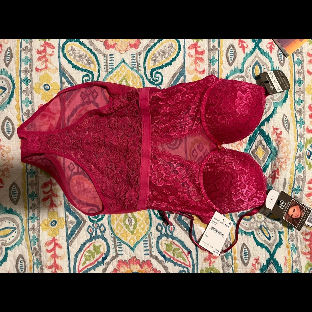 NWT never worn (obviously) or tied on. Deep rose lingerie.